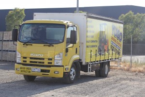 Photograph of Yellow Light Rigid Truck